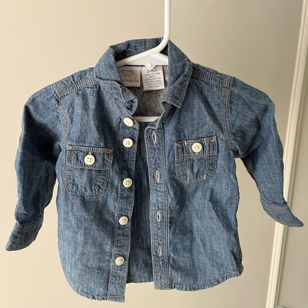Button down, looks cute on its own or open with another shirt underneath.